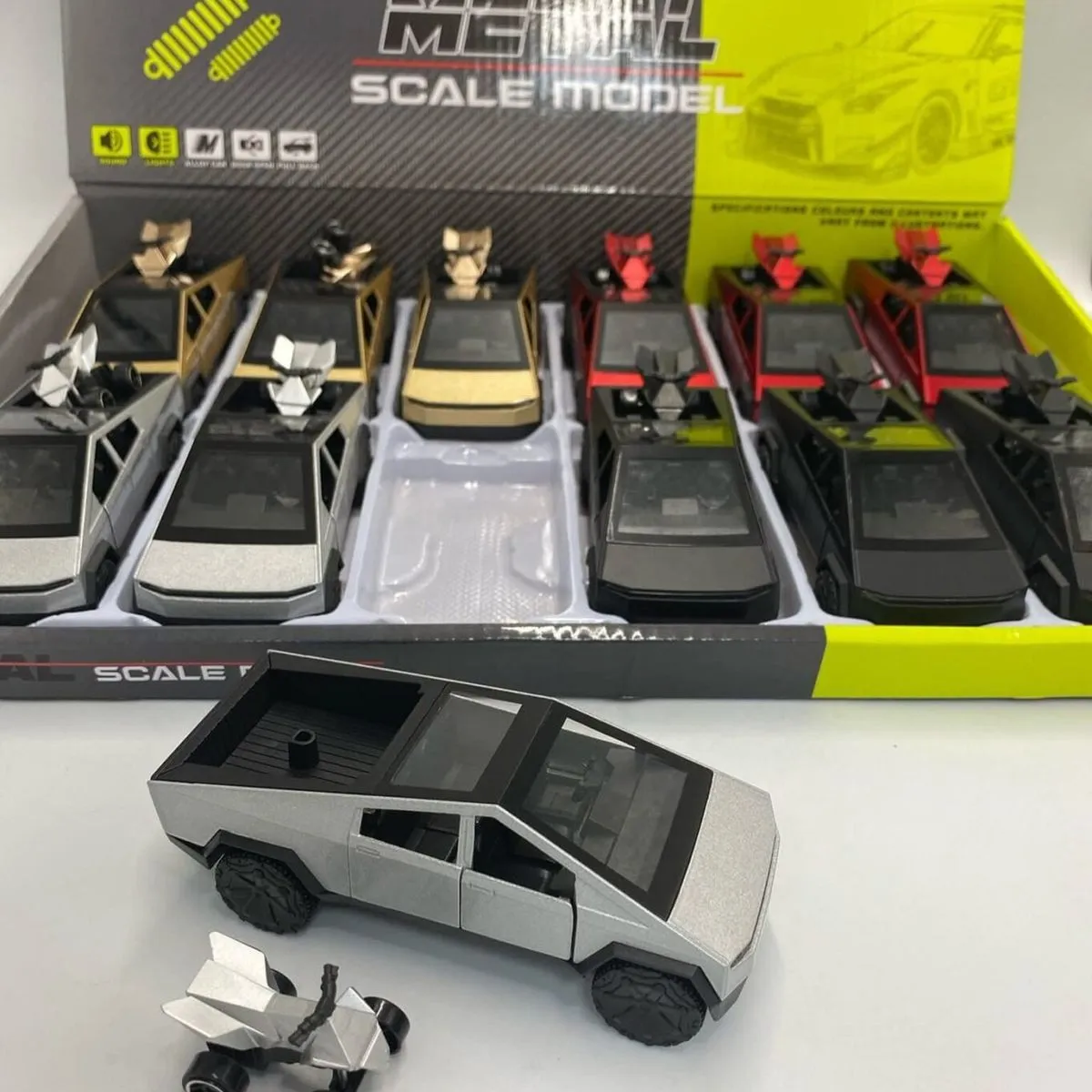 Metalowe modele scale Tesla Cybertruck i quad 11005