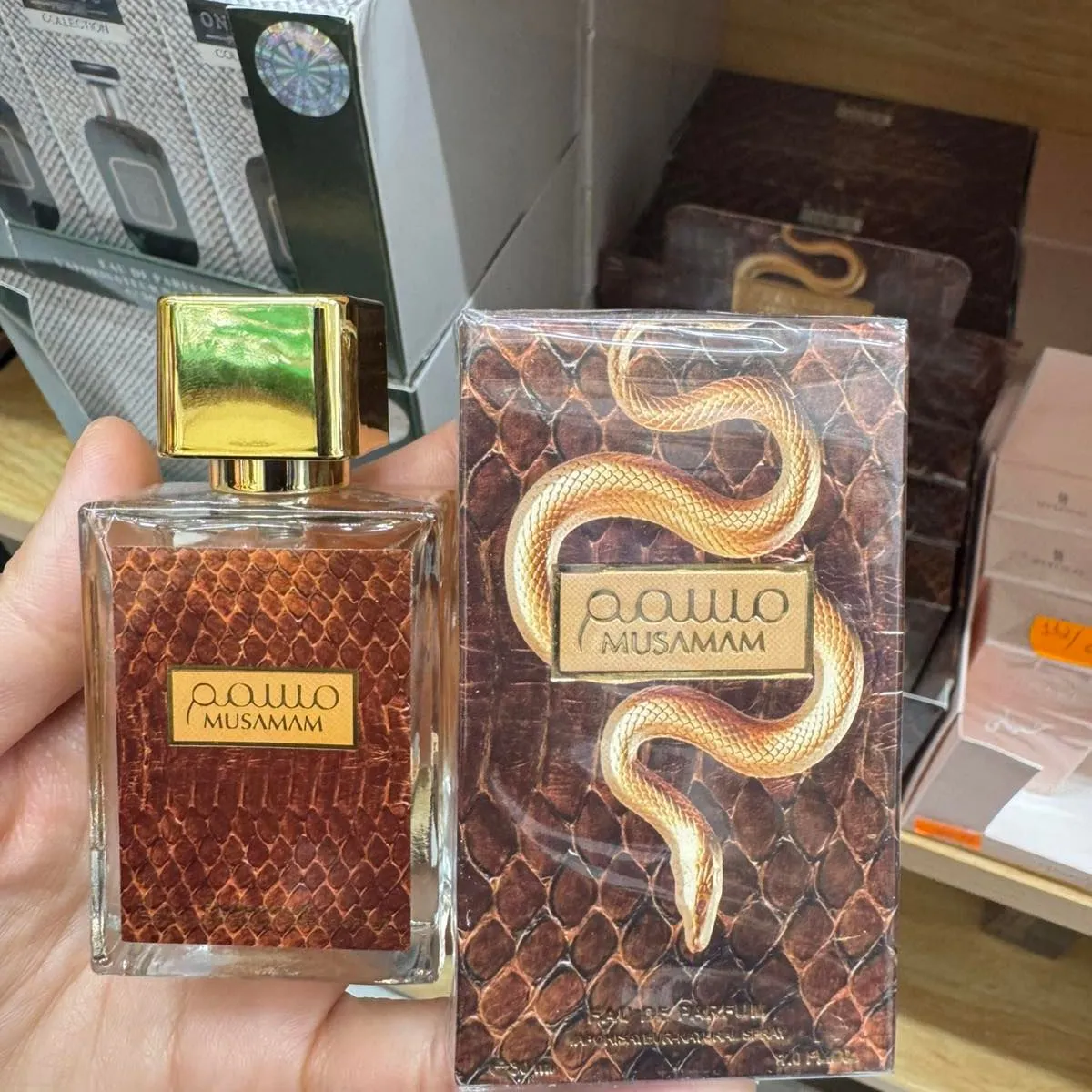 Perfumy Musam 30ml w opakowaniu z motywem węża