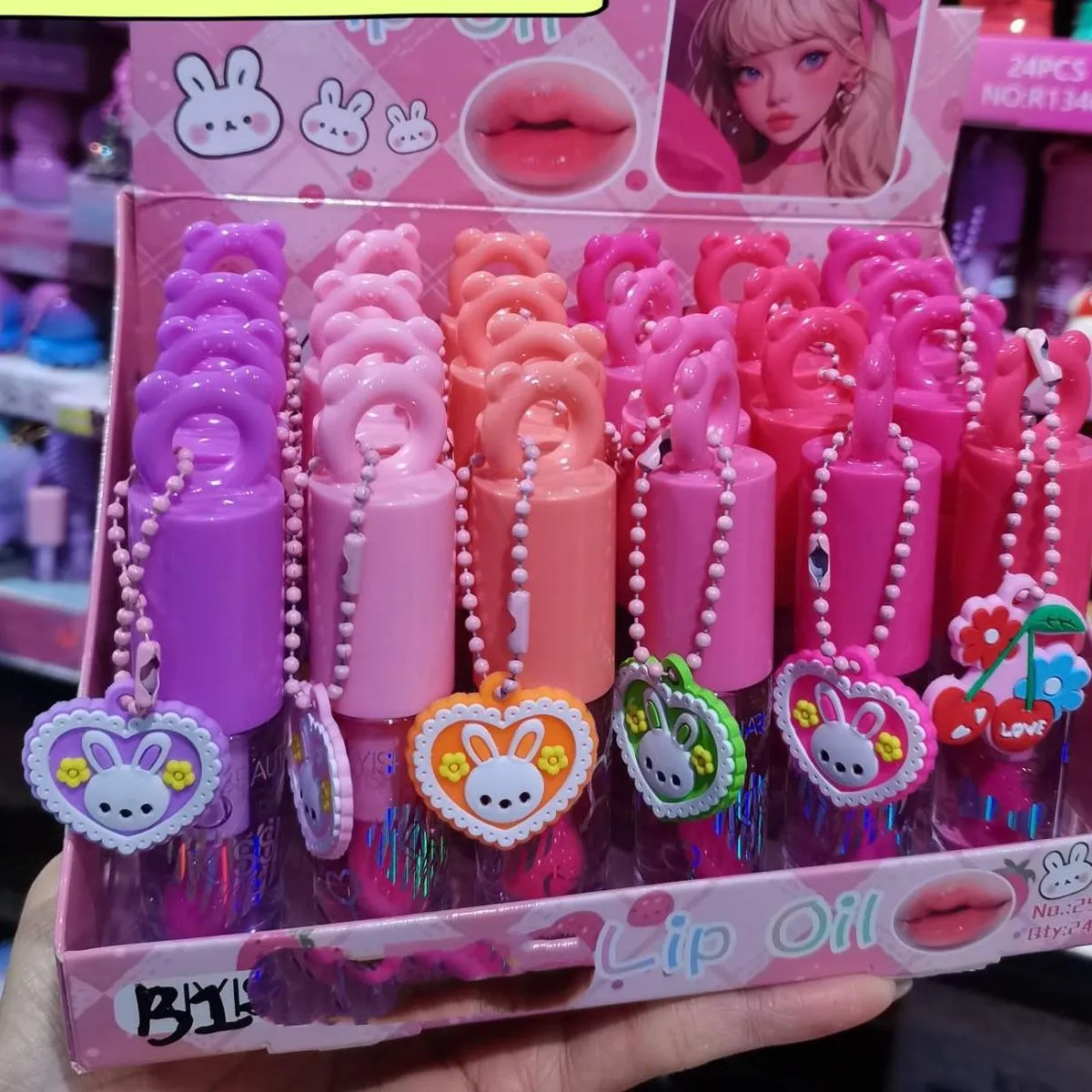 Balsam do ust Lip Oil w sztyfcie z zawieszką, 24 szt