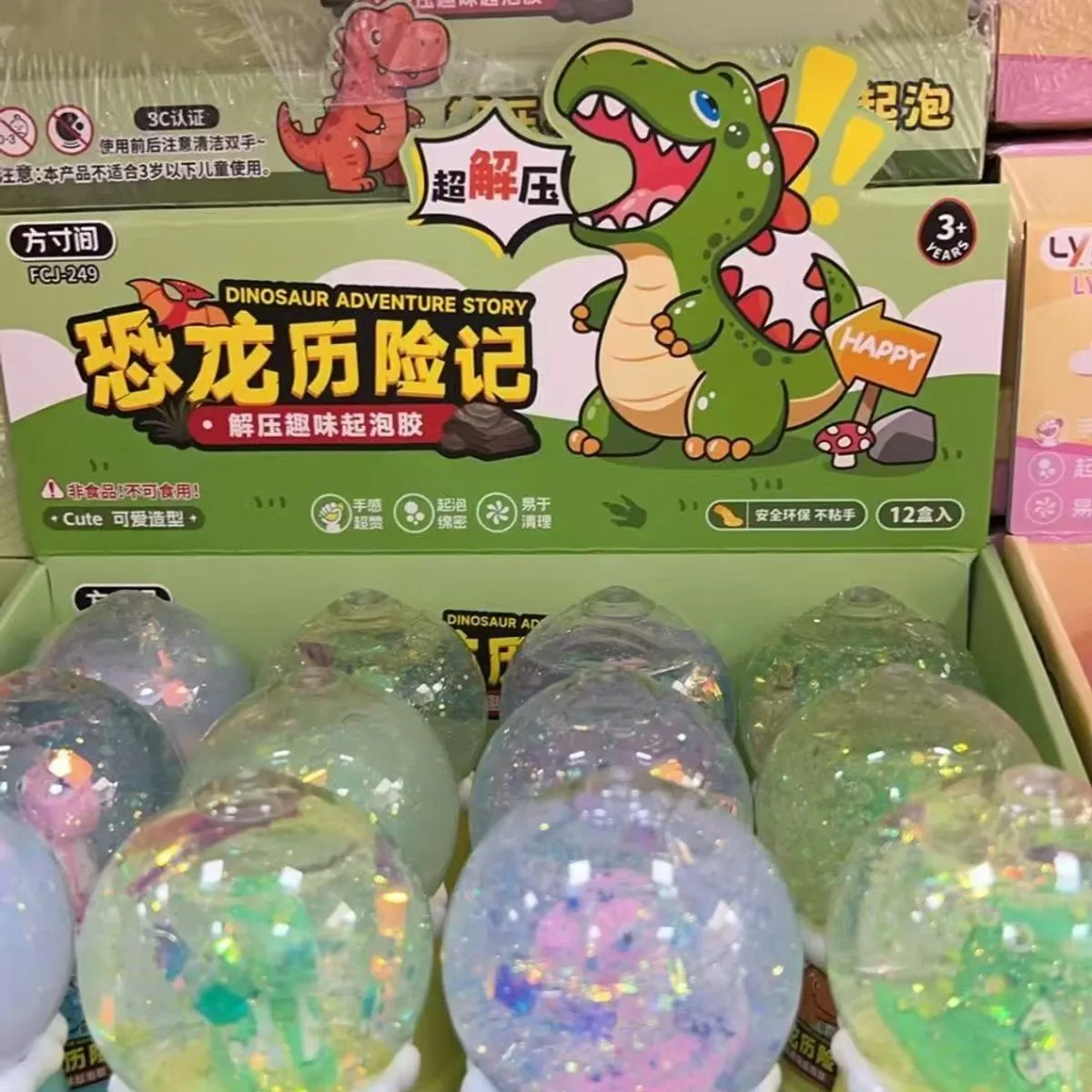 Zabawki Slime Dino w kuli, 12 szt/opak.