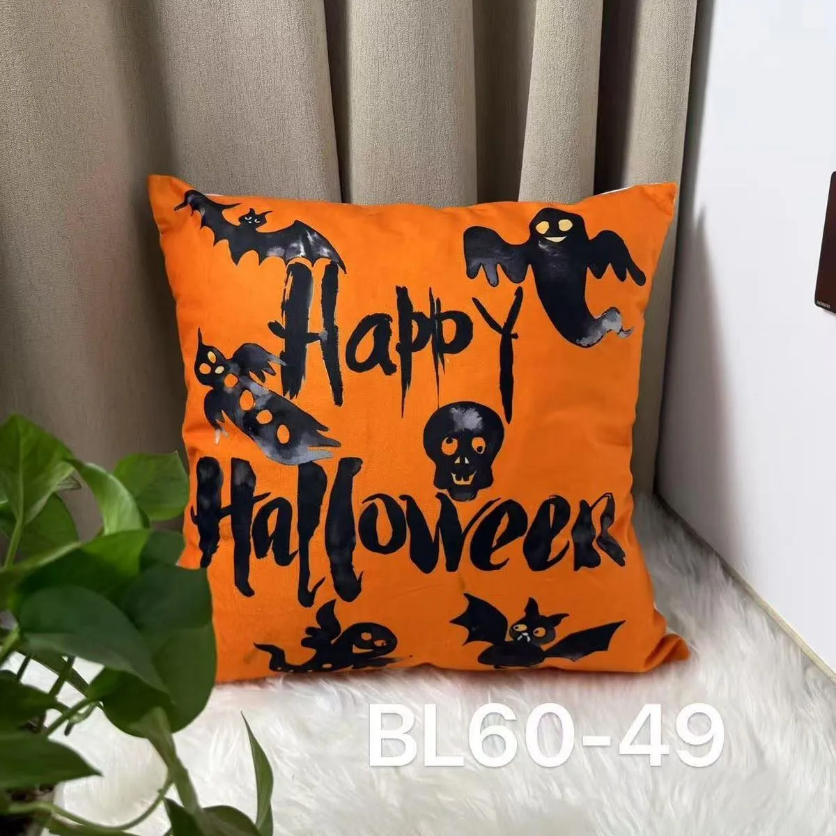 Poszewka Halloween 40x40cm pomarańczowa z nietoperzami