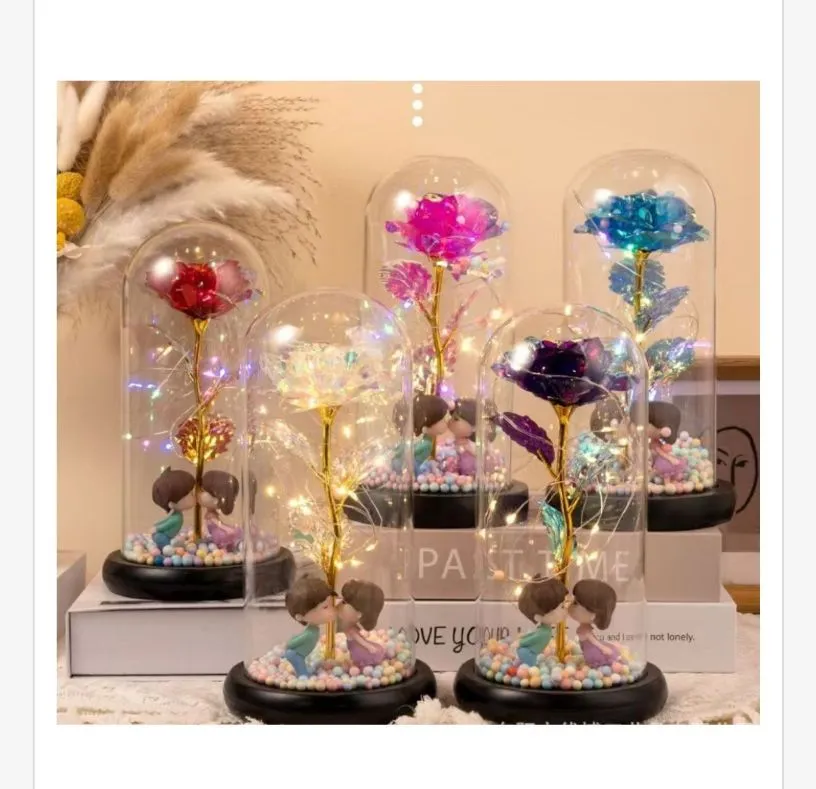 Lampka LED w szkle z kwiatami i figurkami