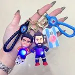 Breloki gumowe LED z motywem piłkarzy Messi, 24 szt/opak.