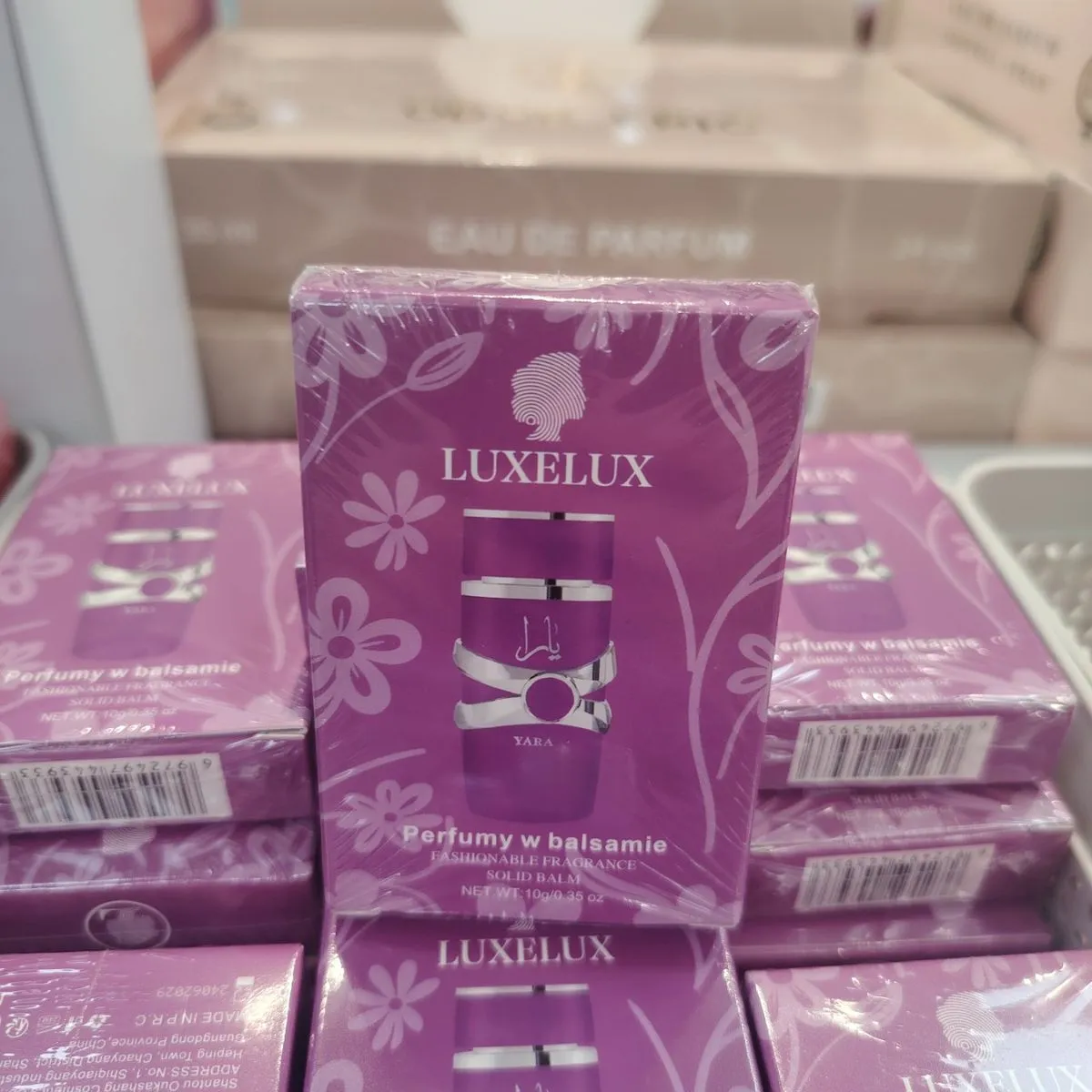 Perfumy w balsamie Luxelux fioletowe pudełko