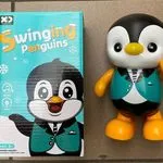 Tancerz Pingwin Swing Muzyka z Światłem