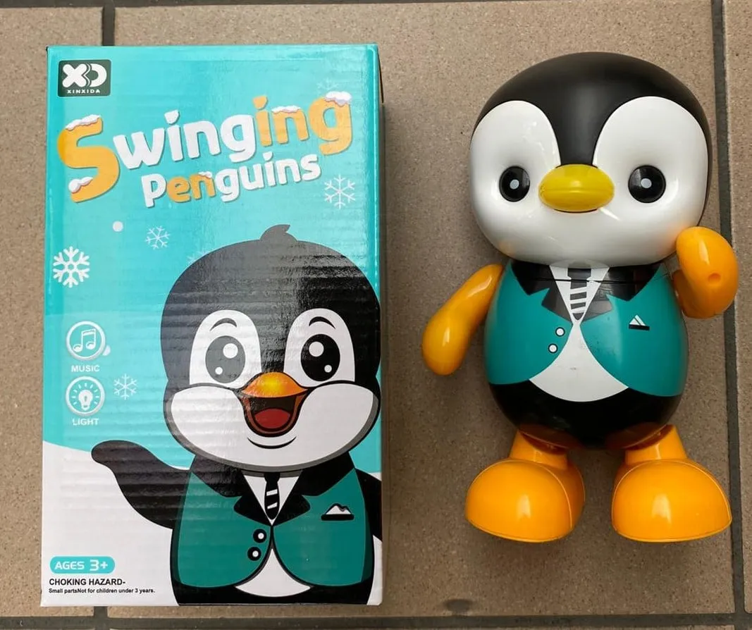 Tancerz Pingwin Swing Muzyka z Światłem