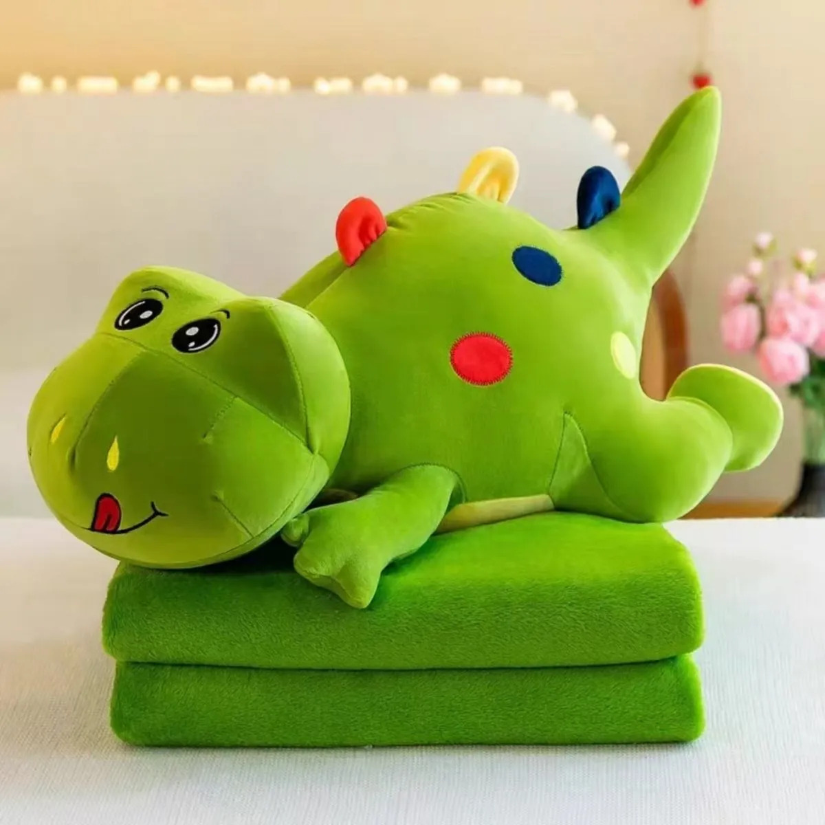 Maskotka dinozaur z kocykiem zielony