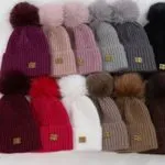 Czapki damskie z pomponem i logo MONCLER, 12 szt