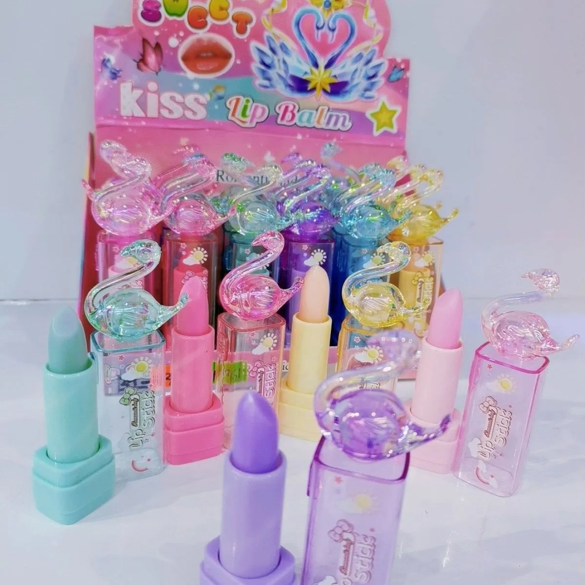 Kiss Lip Balm Romantic Lady - balsamy do ust w różnych kolorach