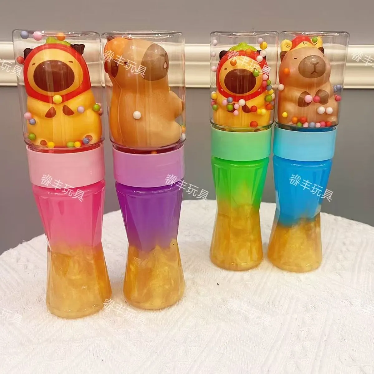 Zabawki Slime Kapibara w butelce z figurką i kuleczkami, 12 szt.