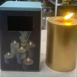 Świeca LED 7x10cm złoty metaliczny płomień