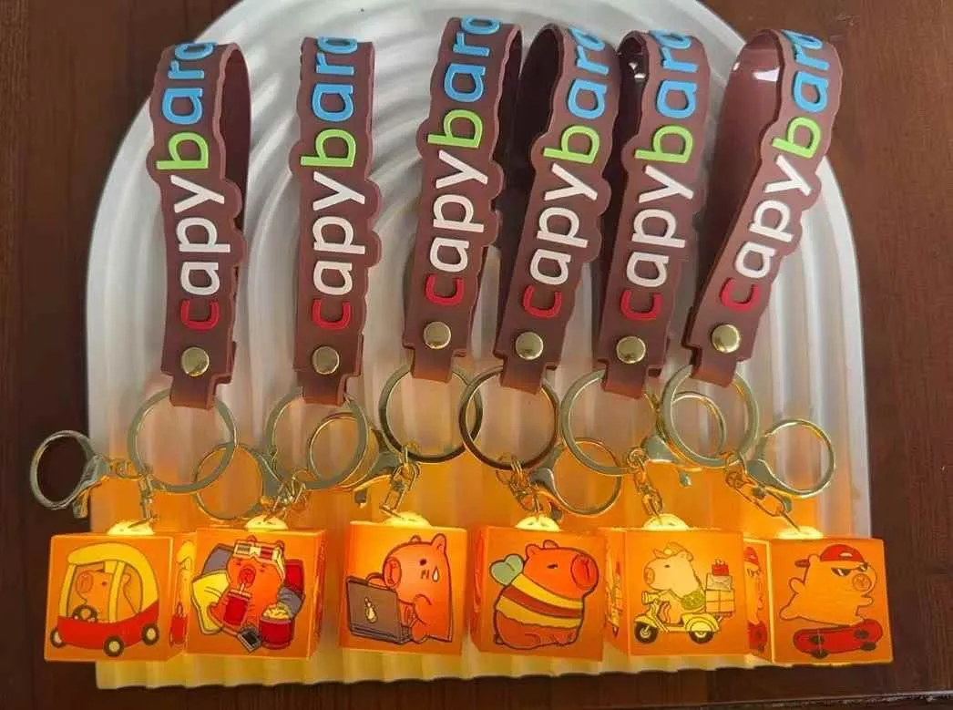 Brelok Kapibara LED Kostka z Paskiem Silikonowym