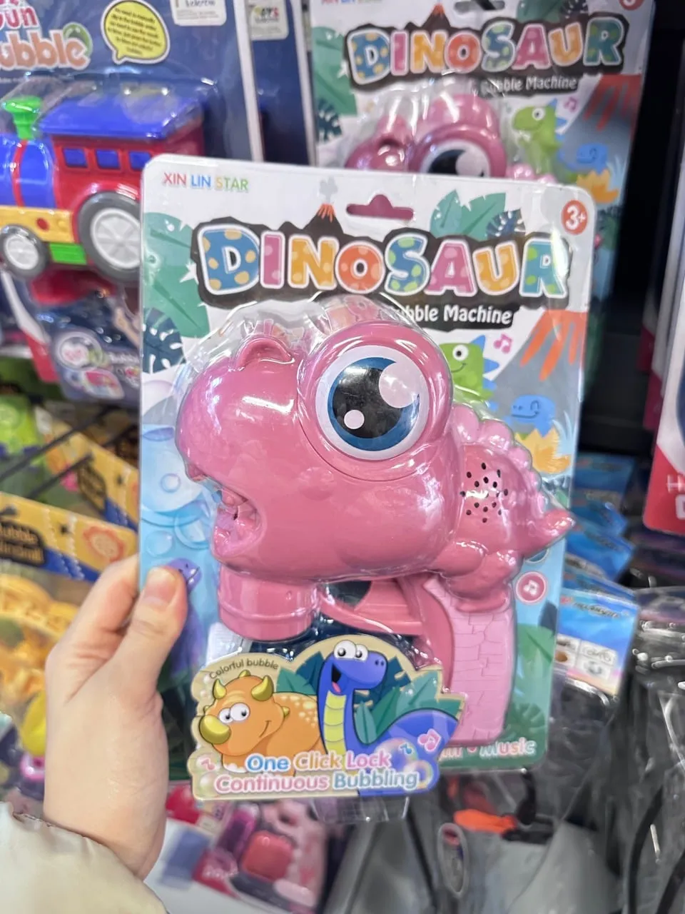 Pistolet do baniek Dinosaur Bubble Machine różowy, z muzyką i światłem
