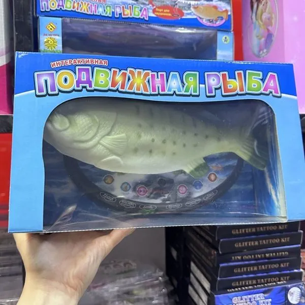 Interaktywna ryba muzyczna PK12866 - ruchoma zabawka na podstawce