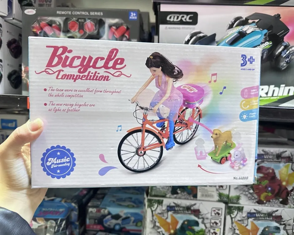 Zabawka rowerowa z lalką i psem Bicycle Competition, światło i dźwięk