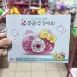 Aparat na bańki mydlane Bubble Camera różowy z żółtą kokardką