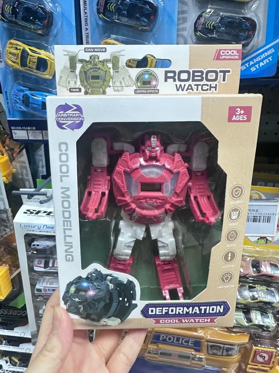 Robot zegarek transformujący z funkcją światła, różowo-biały