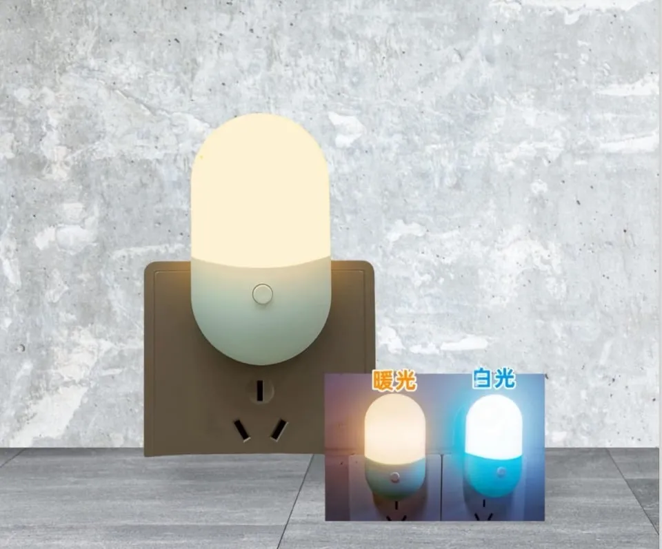 Lampka nocna LED do gniazdka, 2 kolory światła, owalna z przyciskiem
