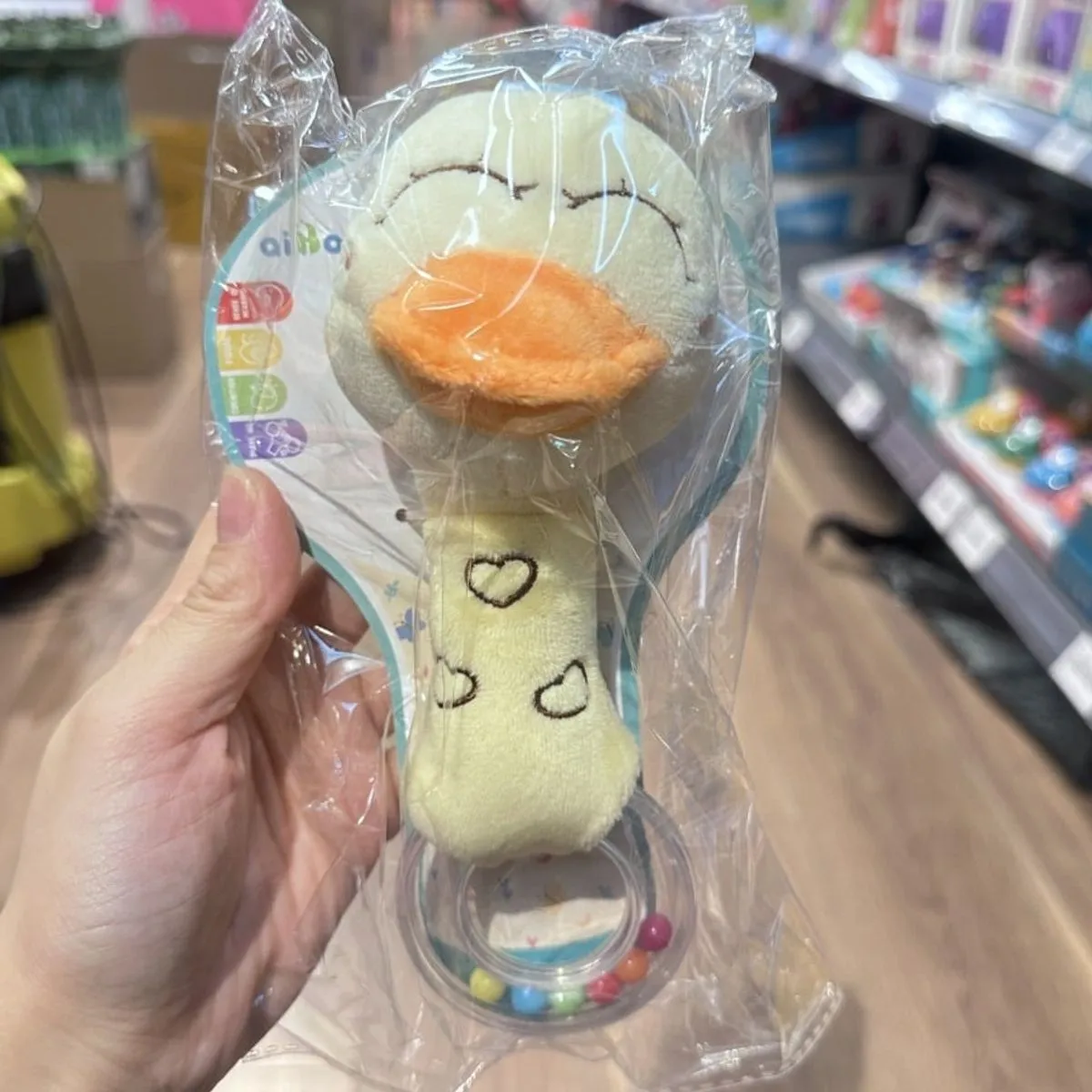 Pluszowa grzechotka-gryzak małpka pastelowa z koralikami, PK13517