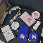 Torebka na telefon Hello Kitty z cyrkoniami i szerokim paskiem