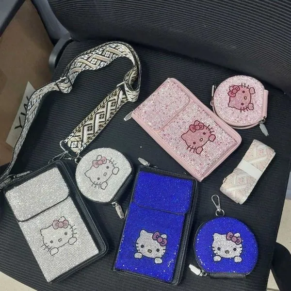 Torebka na telefon Hello Kitty z cyrkoniami i szerokim paskiem