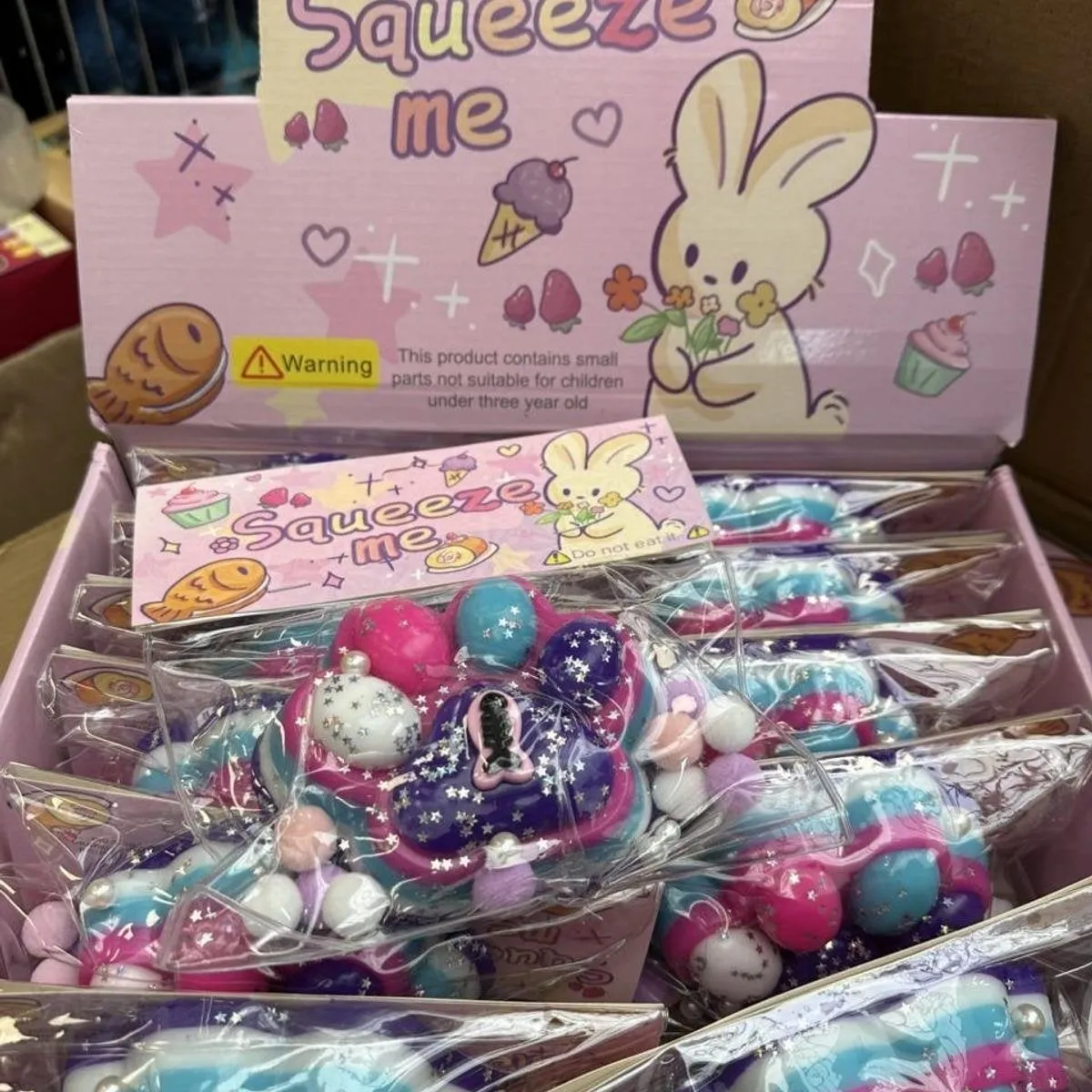 Zabawki Squeeze Me - Gniotek Łapka z Brokatem, 12 szt.