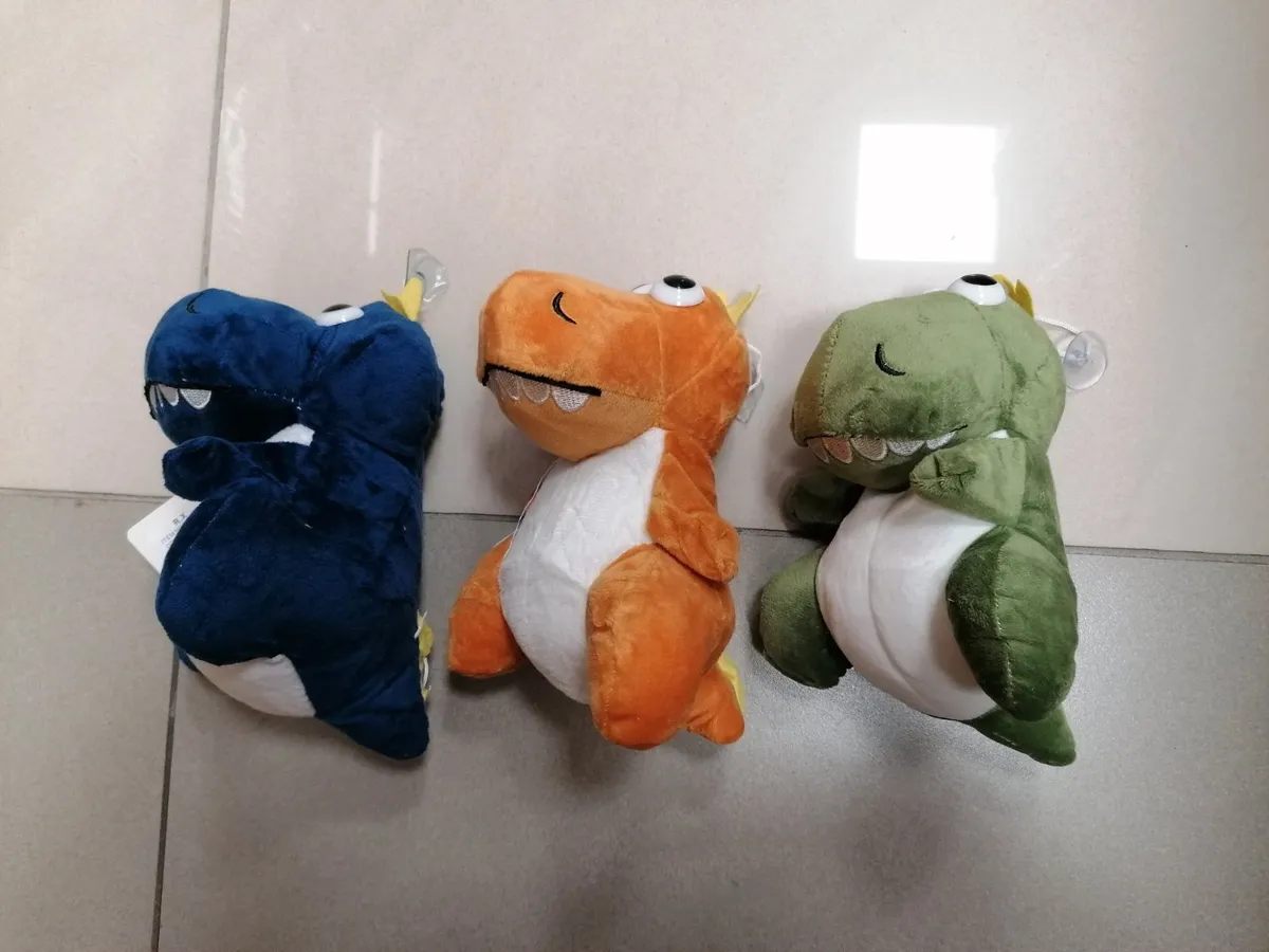 Zestaw pluszowych dinozaurów 20cm niebieski pomarańczowy zielony