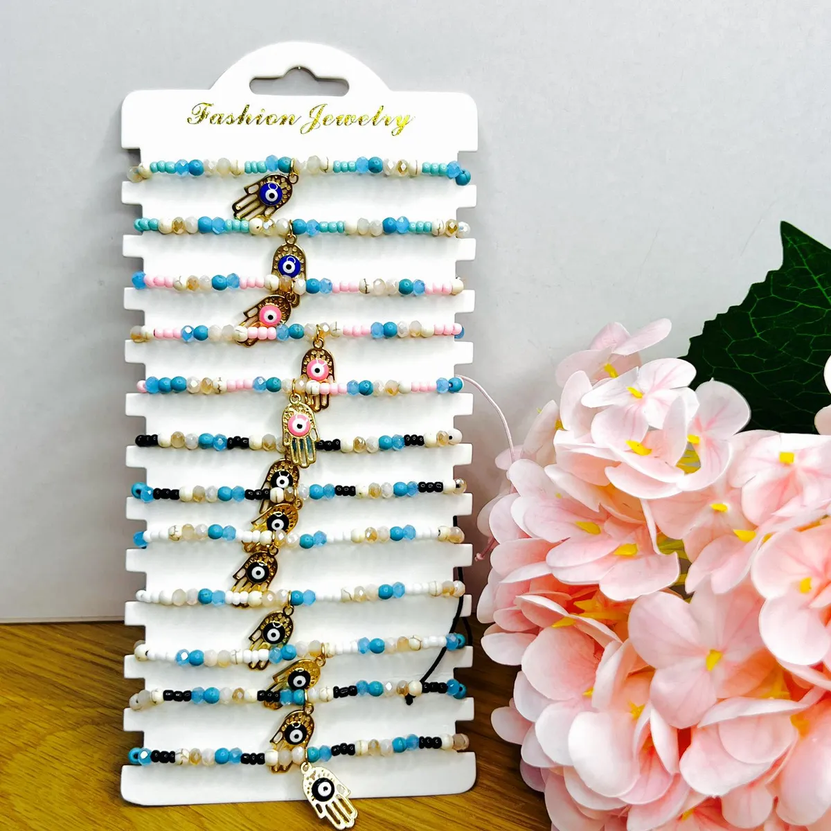 Bransoletki koralikowe z charmsem Oko proroka turkusowe