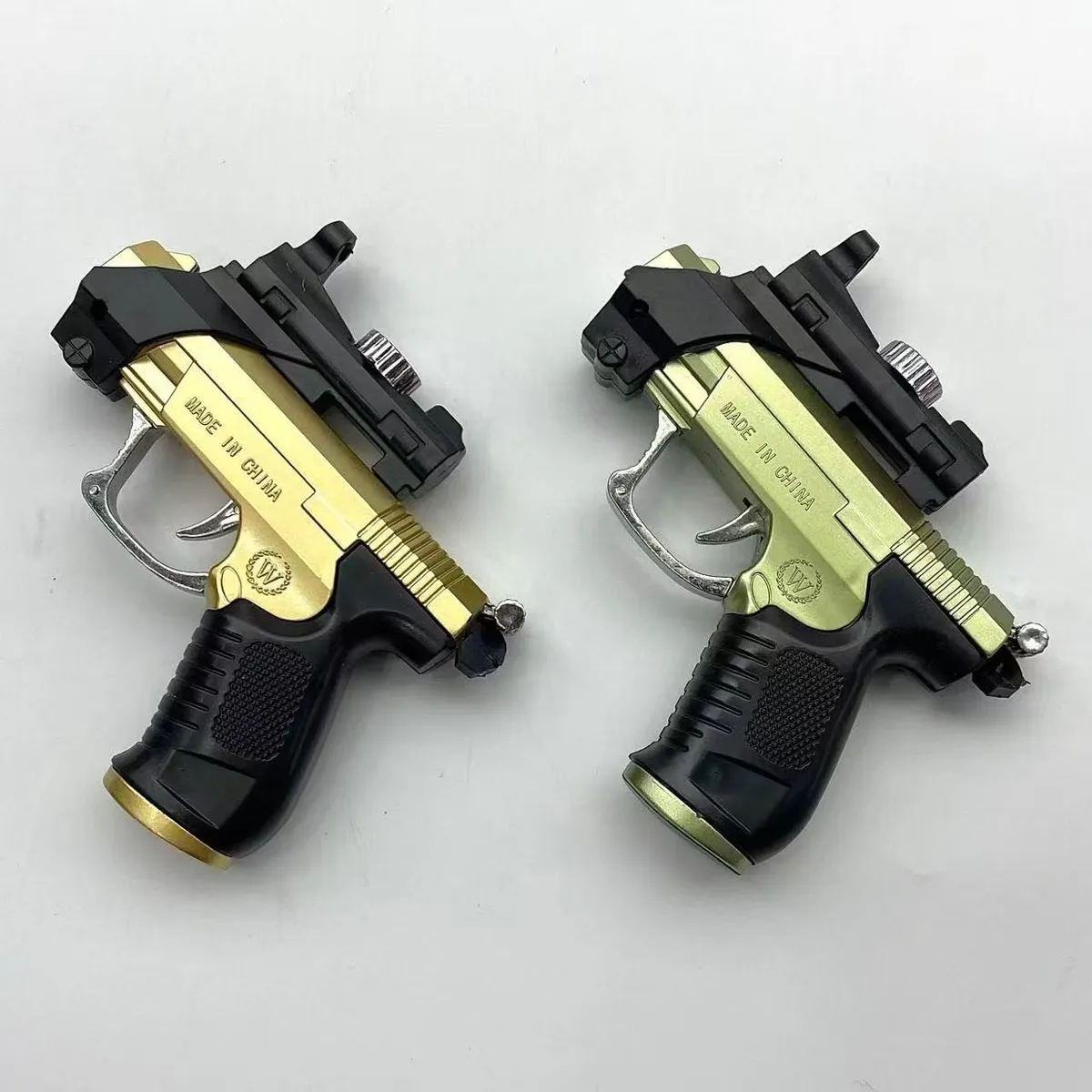 Zabawkowy pistolet na wodę złoty i miętowy