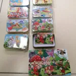 Metalowe Puzzle Dziecięce w Pudełku z Różnymi Motywami