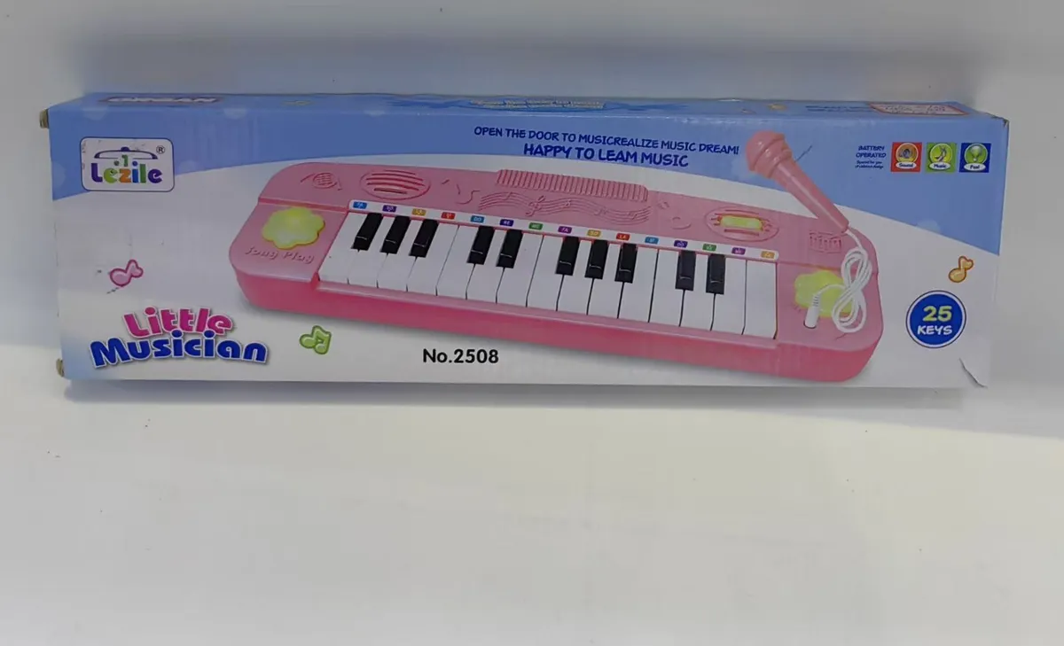 Mały różowy keyboard 25-klawiszowy z mikrofonem Little Musician