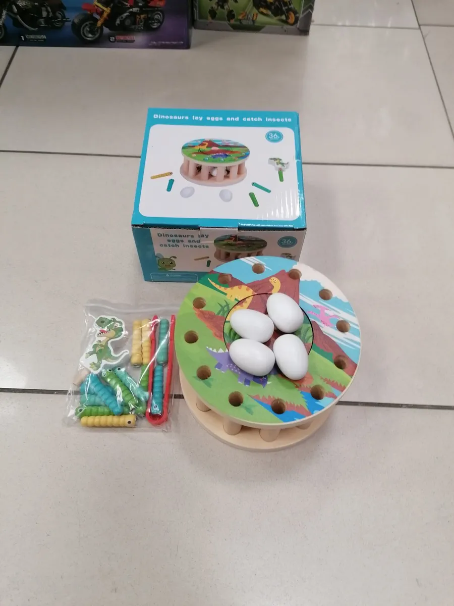 Drewniana gra edukacyjna Dinozaury z jajkami i robakami