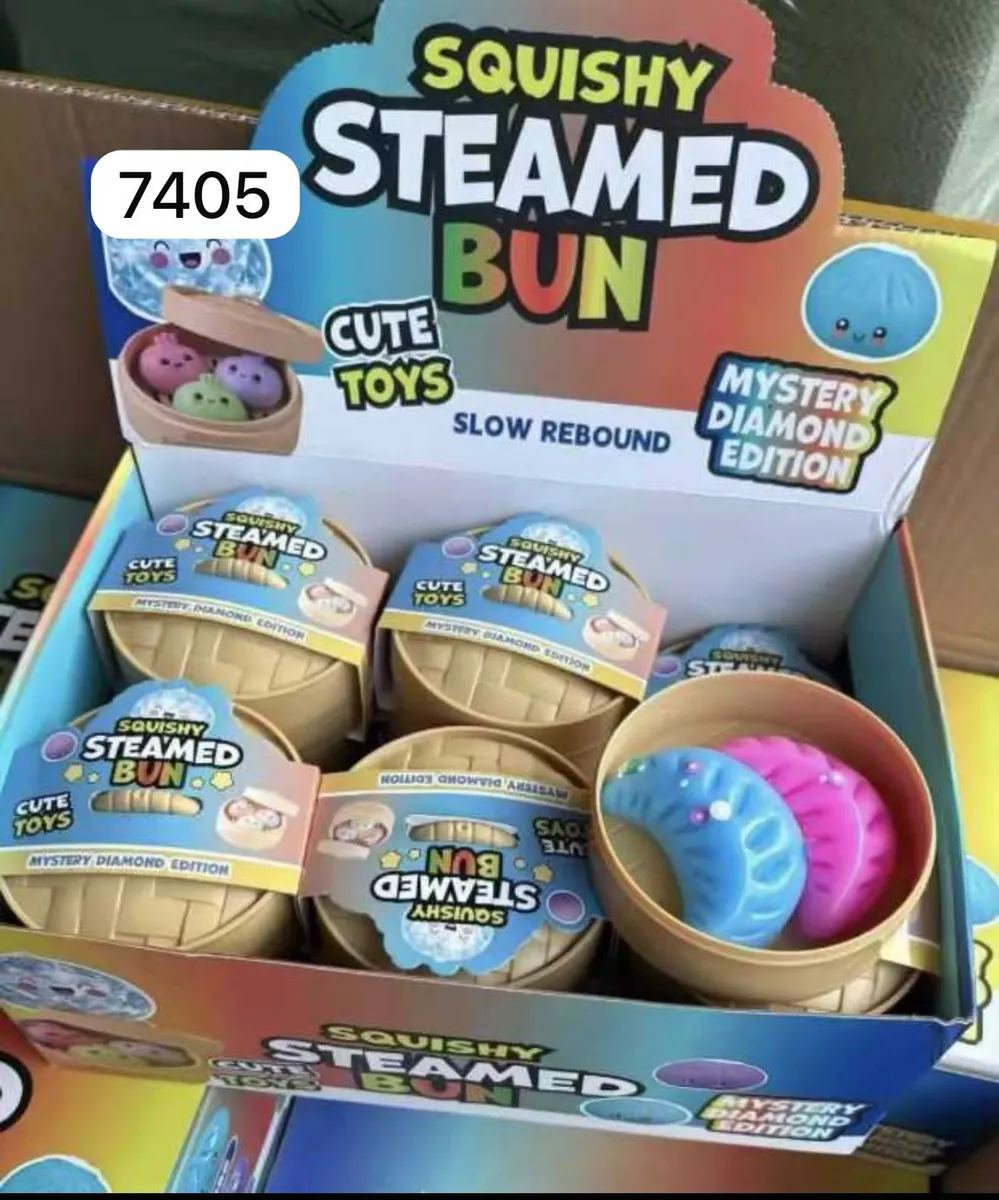 Zabawki Squishy Steamed Bun w opakowaniach bambusowych koszyków, pastelowe różowe i niebieskie bułeczki z błyszczącymi elemen