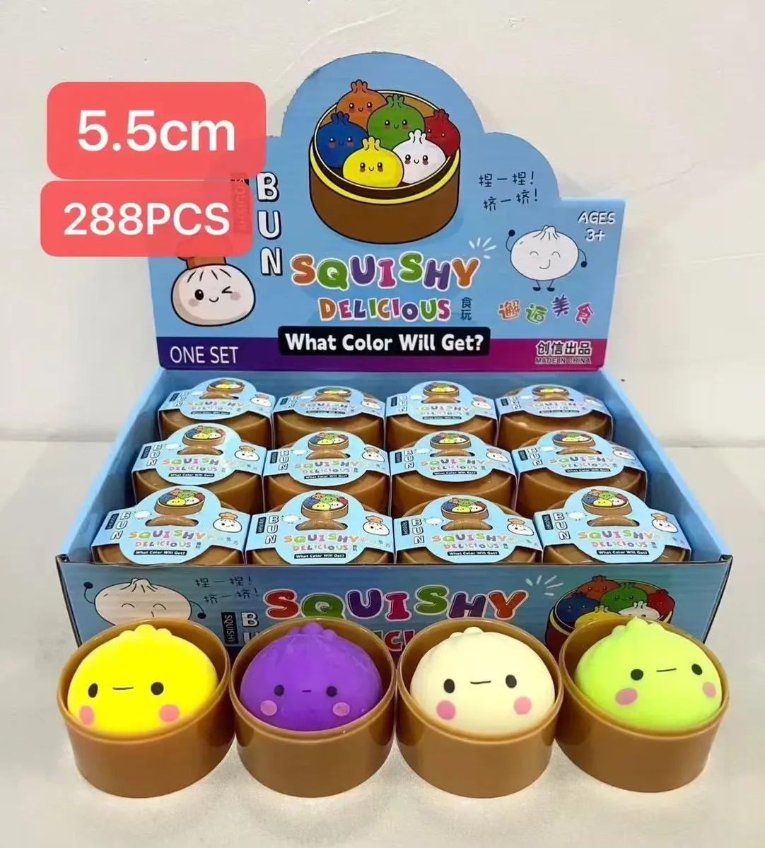 Kolorowe miękkie zabawki squishy w kształcie bułeczek w brązowych pojemnikach