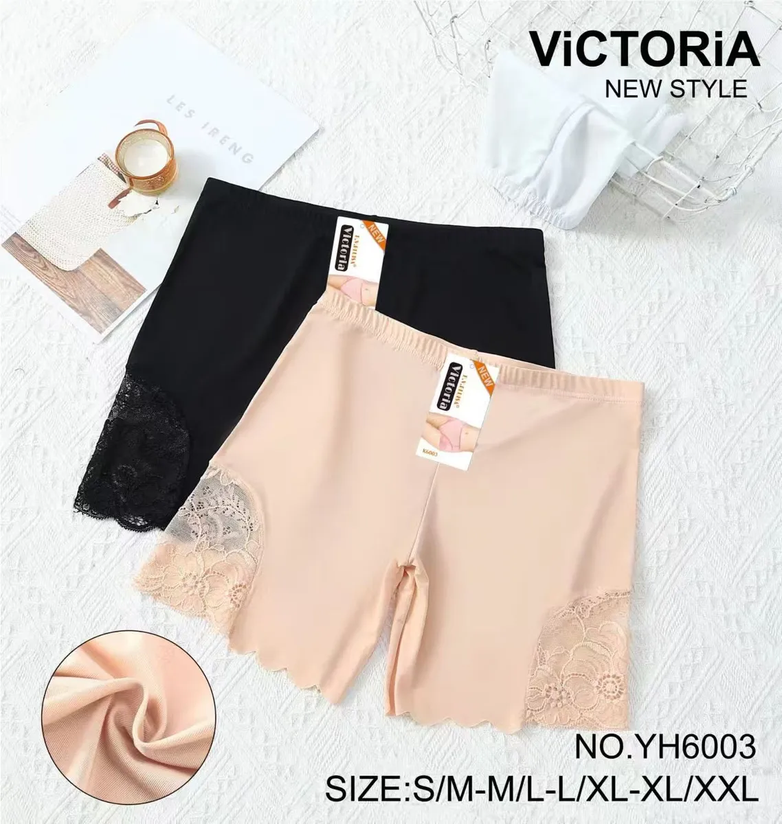Damskie majtki z koronką w kolorze beżowym i czarnym na białym tle z metkami Victoria New Style