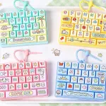 Zabawka edukacyjna mini klawiatura pastelowa z brelokiem