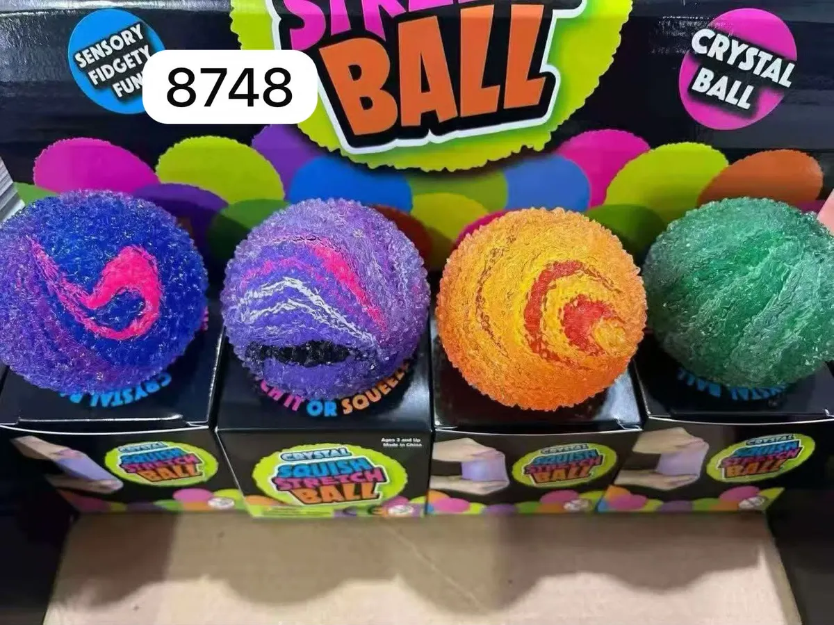 cztery kolorowe sensoryczne piłki antystresowe Crystal Squish Stretch Ball w opakowaniach