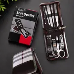 Zestaw do manicure i pedicure 9 elementów w etui w kratę brązową