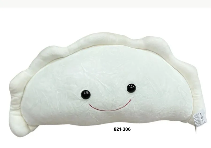 Biała maskotka w kształcie pieroga z czarnymi oczami i uśmiechniętą buzią, wykonana z miękkiego pluszu, długość 70 cm
