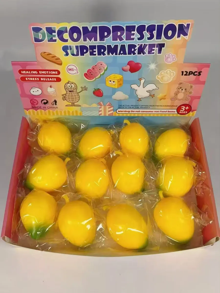 Zestaw 12 żółtych gniotków w kształcie cytryn w kartonowym opakowaniu Decompression Supermarket