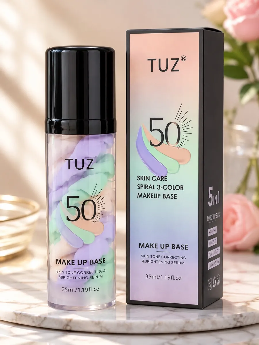 Baza pod makijaż TUZ SPF50 w przezroczystym opakowaniu z czarną zakrętką i kolorową spiralą 3-Color obok czarno-tęczowego kar