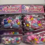Zabawka sensoryczna Squishy pastelowa z ozdobami i brokatem