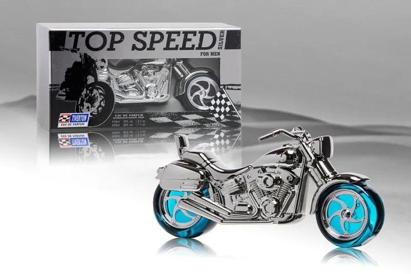 srebrny metaliczny flakon w kształcie motocykla z niebieskimi kołami i opakowaniem
