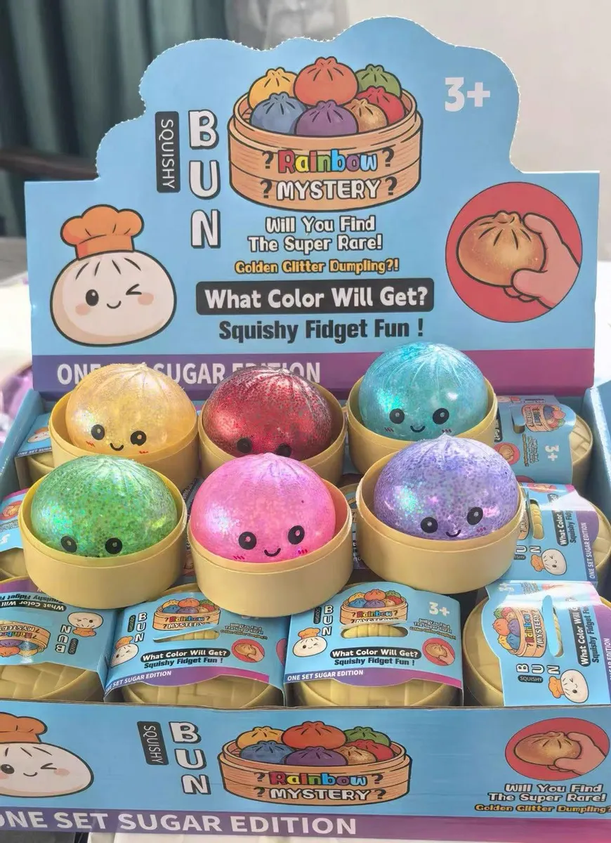 Kolorowe squishy w kształcie bułeczek z błyszczącym wykończeniem w opakowaniu ekspozycyjnym