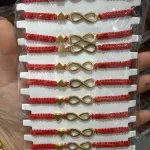 Bransoletki Fashion Jewelry czerwone z symbolem nieskończoności i sercem
