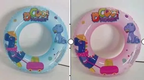 Dwa koła do pływania 80 cm, jedno jasnoniebieskie, drugie jasnoróżowe z nadrukiem dinozaura i kolorowymi kropkami