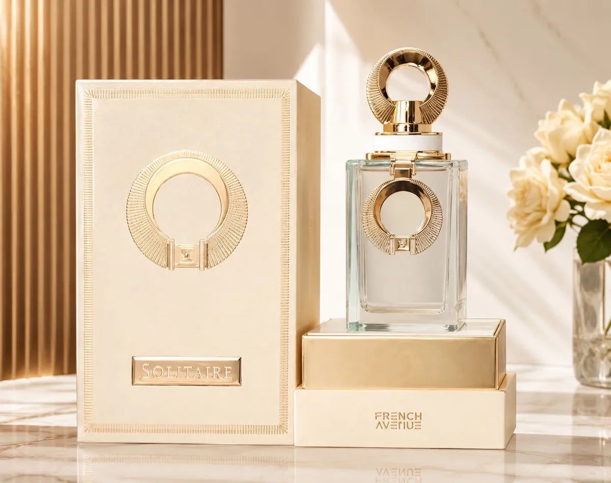 Perfumy Solitaire French Avenue 100ml w szklanym flakonie z złotymi zdobieniami i kremowym opakowaniu