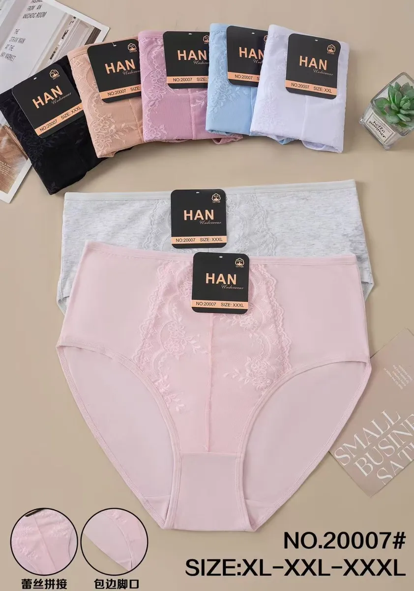 Majtki damskie HAN w pastelowych kolorach z koronkowym zdobieniem, rozmiary XL-XXXL, opakowania na stole