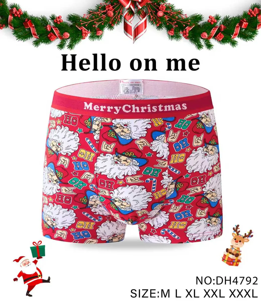 czerwone bokserki męskie z nadrukiem świątecznego Mikołaja i napisem Merry Christmas na gumce