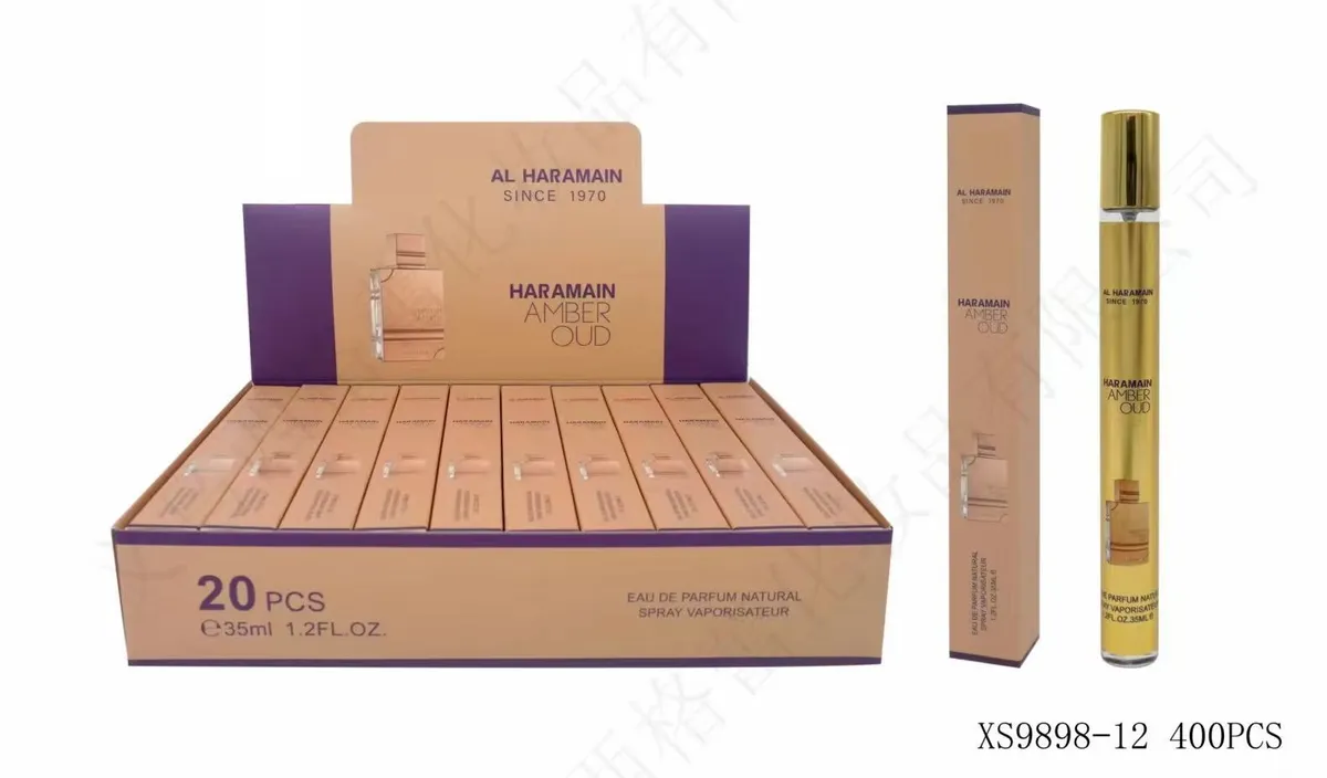 Zestaw 20 perfumetek Al Haramain Amber Oud 35ml w beżowo-fioletowym opakowaniu i pojedyncza złota buteleczka spray